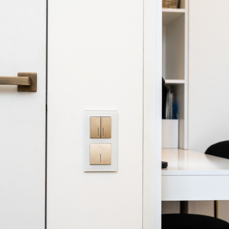 Выключатель проходной двухклавишный с подсветкой без рамки Werkel шампань рифленый W1122110